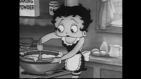 CIRCA 1939 - In this animated film, Betty Boop swats at a housefly in the kitchen and her puppy Pudgy tries to catch it.