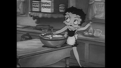 CIRCA 1939 - In this animated film, Betty Boop is annoyed by a housefly while trying to bake and the fly wakes up her sleeping puppy Pudgy.
