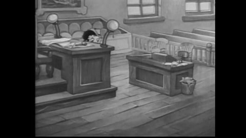 CIRCA 1935 - In this animated film, Betty Boop tidies up a courtroom and tries on the judge's robes.
