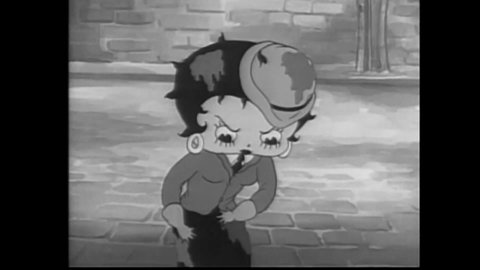 CIRCA 1935 - In this animated film, Betty Boop is splashed with mud by a passing car.