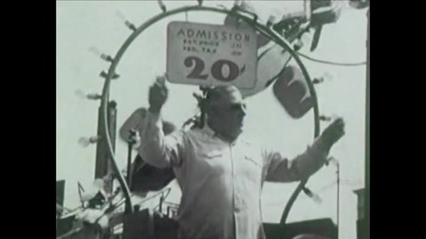 CIRCA 1952 - Coney Island visitors enjoy novelties and rides.