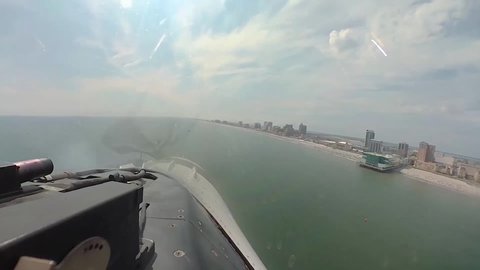 CIRCA 2020 - U.S. Air Force cockpit footage of Thunderbird jet fighter plane aerial team supports COVID-19 first responders.