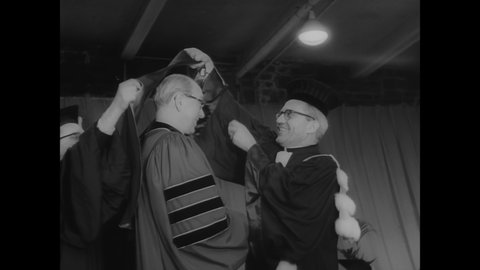CIRCA 1966 - A Jewish leader and leaders of different Christian sects are honored at the convocation ceremony of Fordham University in New York City.