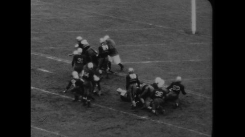 CIRCA 1930 - A football game between West Point's Black Knights and the Yale Bulldogs begins.