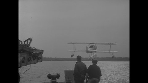CIRCA 1930 - Navy planes undergo test trials with a catapult in Philadelphia, Pennsylvania.