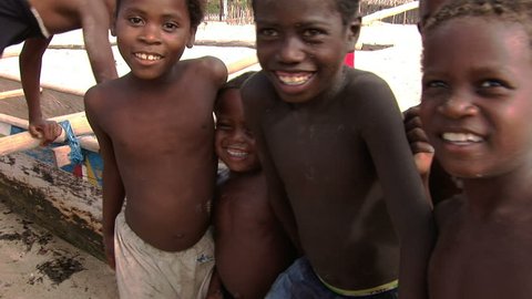 TULEAR/MADAGASCAR 7TH MARCH 2010 -Children smile to camera in a remote fishing village in the south of Madagascar
