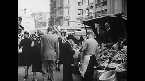 CIRCA 1949 - Restaurants and food stands in Little Italy, New York.