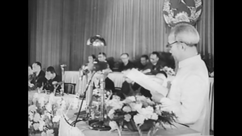 CIRCA 1973 - Ho Chi Minh gives speeches at different venues to excited villagers.