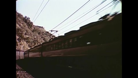 CIRCA 1963 - Commuter trains and super express trains are used in Japan.