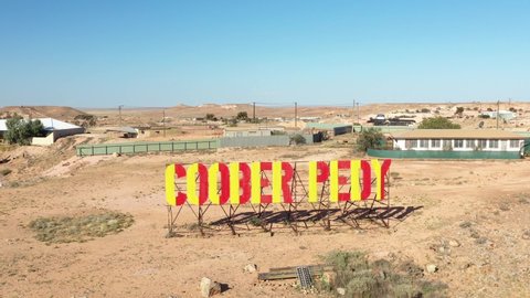 COOBER PEDY, SOUTH AUSTRALIA - CIRCA 2020 - Excellent aerial shot of the sign welcoming people to Coober Pedy, South Australia.