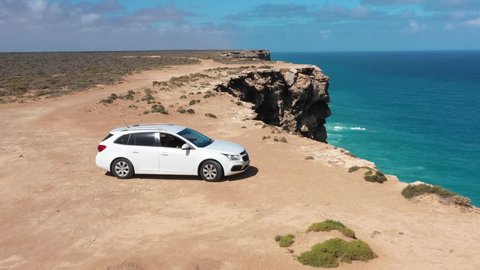SOUTH AUSTRALIA - CIRCA 2020 - Excellent aerial shot of a car parked on the edge of the Great Australian Bight in south Australia.