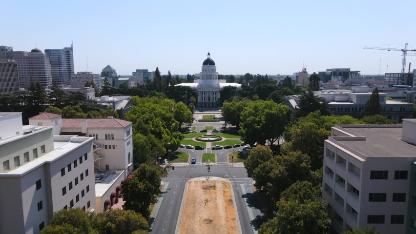 SACRAMENTO, CALIFORNIA - CIRCA 2020 - An excellent aerial shot approaches the capitol building of Sacramento, California.