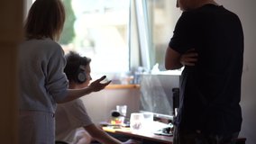 Married couple scolds their teenage son in his room. The boy sits near the computer. Domestic violence and abuse concept - Powered by Shutterstock - Get 15% off with code: PIKWIZARD15