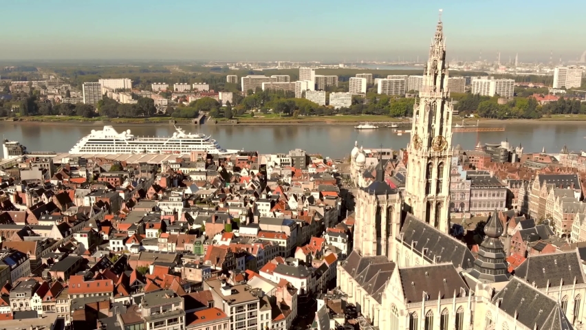 Cathedral of Our Lady amid Antwerp cityscape and Scheldt river, Belgium - Aerial wide Panoramic shot | Shutterstock HD Video #1071475732