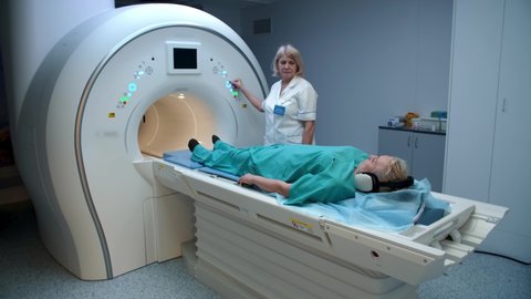 Patient senior woman during mri scan