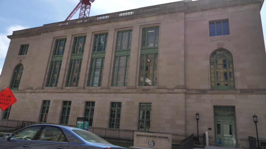 Driving By Madison Municipal Building, Winconsin, USA. City Government Office on Sunny Summer Day, Passenger POV
