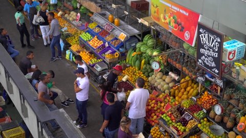 people at the Mercado Municipal de Chacao market in the Chacao district of Caracas, the capital of Venezuela, circa Mach 2019