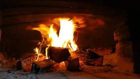 video of firewood burning in the stove