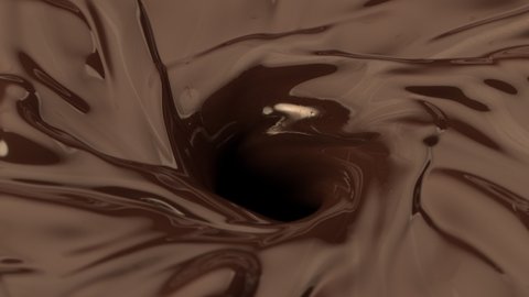 Super Slow Motion Shot of Melted Chocolate Vortex .