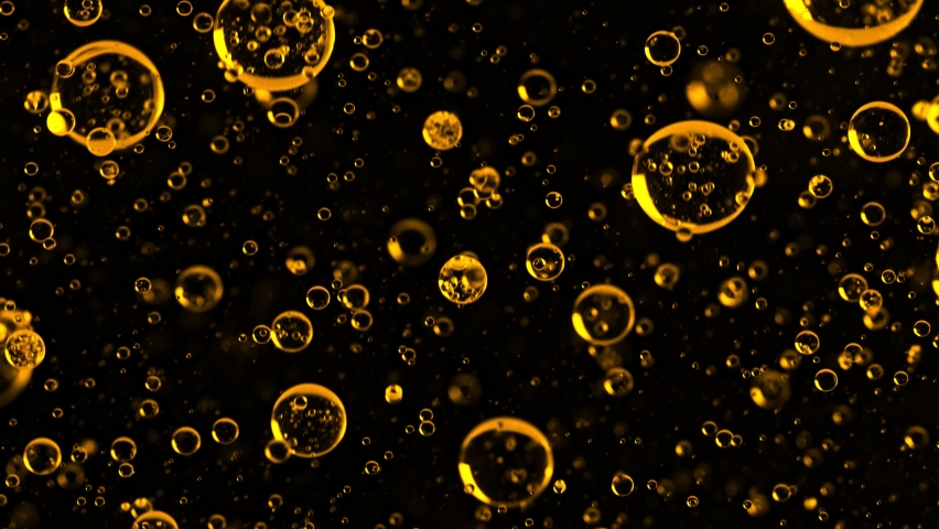 Super Slow Motion Shot of Moving Oil Bubbles Isolated on Black Background . Royalty-Free Stock Footage #1071547510