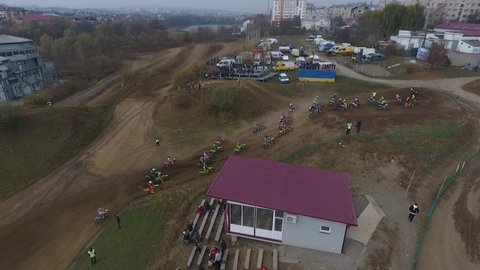 
Extreme sport motorcycle race,Aerial shot of motocross start, the motocross competition. Aerial view slow motion Motorcyclists on motocross. big jumps on championship 
