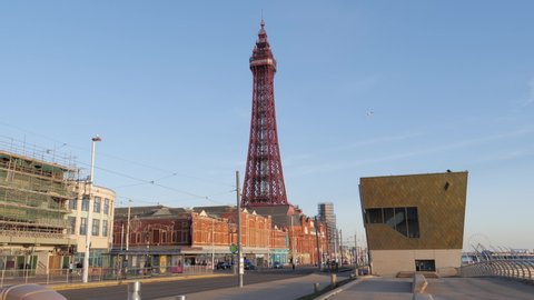 4K: Blackpool Promenade with The Tower, England, UK. Traffic drives along the Coastal Road. Stock Video Clip Footage