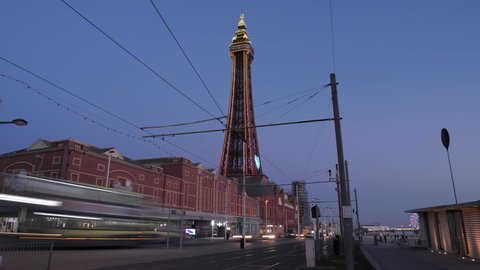 4K: Blackpool Promenade Timelapse with The Tower, England, UK. Traffic drives along the Coastal Road at dusk. Stock Video Clip Footage