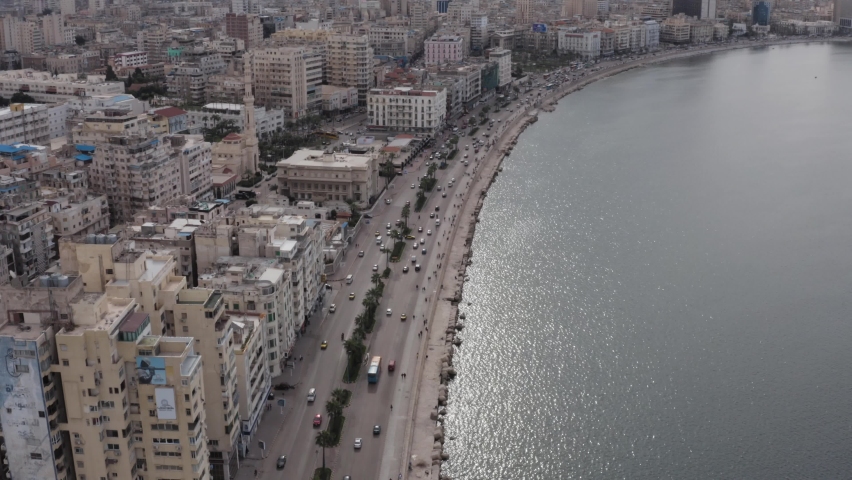 Aerial Drone shot over Egypt Alexandria city streets downtown 