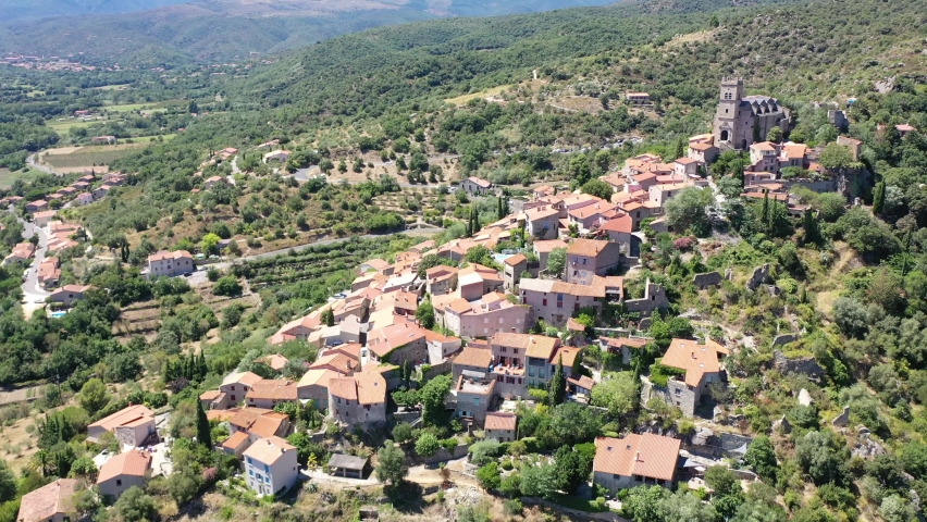 Panoramic view from above on the city Eus. Small town located on high mountain. Eastern Pyrenees. France. High quality 4k footage