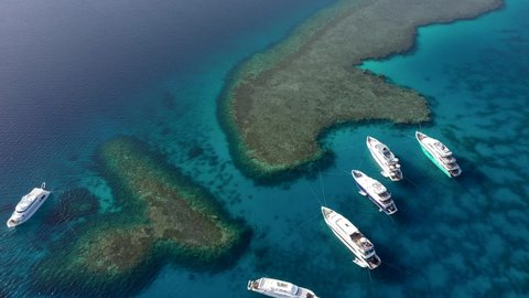 Aerial view: Boats stand on a beautiful reef in the Red sea, Egypt