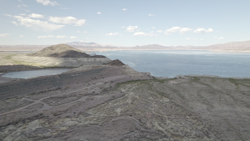 Flyover of hill at Lake Mead Las Vegas Boulder City Nevada desert aerial drone 4k ungraded flat log raw footage d-log