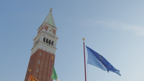 3 Flags in St Mark's Campanile Venice, Italy. (San Marco, Venezia, Italia) 4k