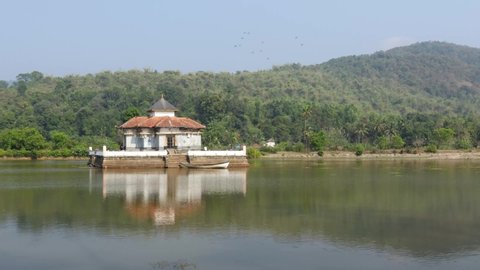 Varanga, Karnataka, India-February 25 2021;A beautiful Jain temple located in a Lake in the picturesque locales of Varanga town dedicated to Goddess Padmavathi is a famous travel destination in India.