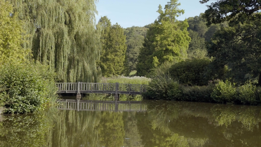 Static shot of bridge over pond at Chartwell, the country house near Kent, England where Winston Churchill lived.