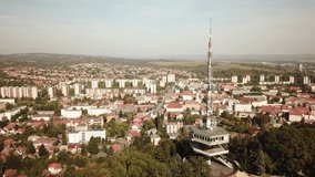 Cinematic aerial drone orbiting footage of the Avas TV Tower in Miskolc, fourth largest city and a major industrial hub, Northern regional center of Hungary, capital of Borsod-Abaúj-Zemplén county