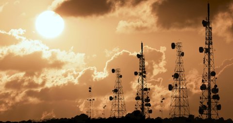 Telecom Towers Transmitter Antennas Trellis 5G Cloudy Sunset Time Lapse