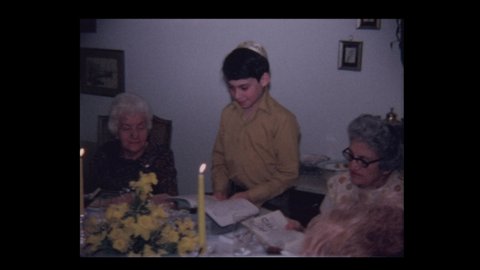 Baltimore, MD, USA, 1971: Youngest son recites the Four Questions at Passover seder