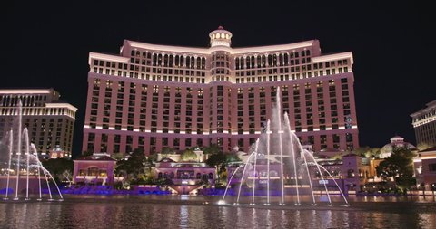 Las Vegas, Nevada USA, March 2021. Fountains at Bellagio Hotel and Casino on world famous Las Vegas the Strip - the capital of night life and adult entertainments. Dancing fountain water show at night