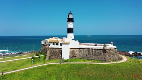Salvador, Bahia, Brazil. Panorama landscape of landmark of city. Famous tourism point of carnival city of Salvador, Bahia, Brazil. Barra Lighthouse, Salvador, Bahia. Seaside coastal city of carnival.