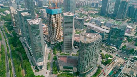 Suzhou, China - September 04, 2020: Aerial cityscape view skyscaper under construction with reflections on the glass windows in a business district of Suzhou, China.