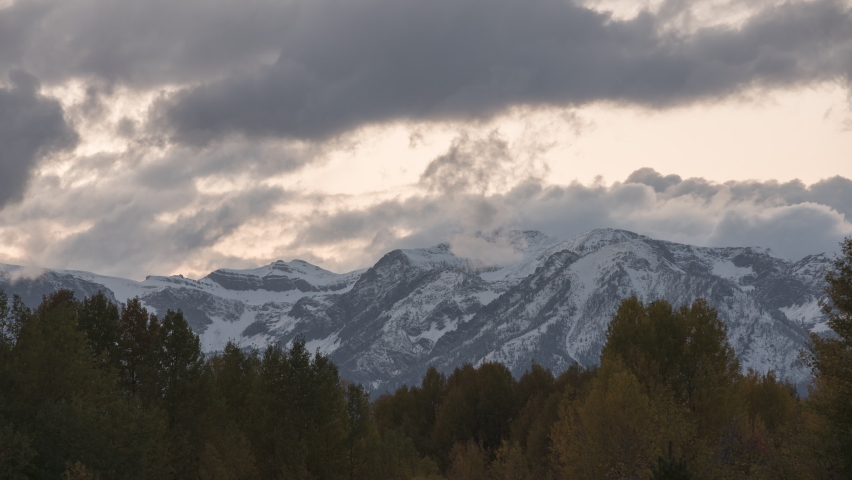 Evening timelapes of Gros Ventre mountainsin Grand Teton National Park during a fall with cloud passing by in Wyoming.