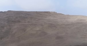 Lima, Lima - Peru - April 29th 2021: Aerial video over Pachacamac temple, archeological complex in Lima Peru. Pre inca culture known as Ychsma. Temple made of mud near to the Pacific Ocean. 