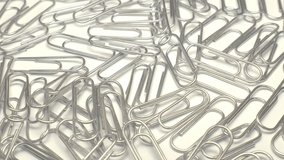 paper clips rotate on white background 