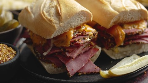 Super deluxe tasty grilled reuben sandwiches with pastrami meat, cheddar cheese
