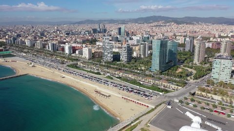 View from drone of Diagonal Mar district on sunny fall day, Barcelona, Spain