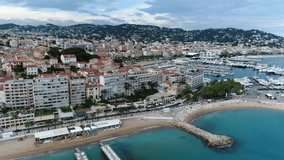 Aerial view of Cannes west beach a city located on the French Riviera it is a commune in the Alpes Maritimes department and host town of the annual Film Festival 4k high resolution quality footage