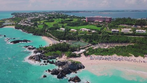Bermuda drone shot of Horseshoe Bay from hight above with the Fairmont Southampton Hotel in the distance and view of the south shore