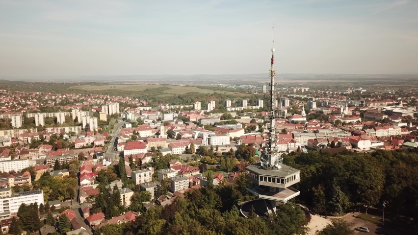Cinematic aerial drone orbiting shot of the TV Tower of Miskolc, fourth largest city and a major industrial hub, Northern regional center of Hungary, capital of Borsod-Abaúj-Zemplén county