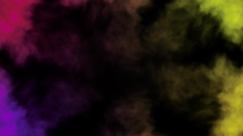 Colorful puffy puffs of smoke on an isolated black background. Overlay VFX Element. Modern colorful blue purple light spectrum. Haze background.