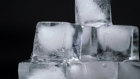 Ice cubes on a black background.
